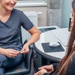 Consultation of an aesthetic doctor in dentistry